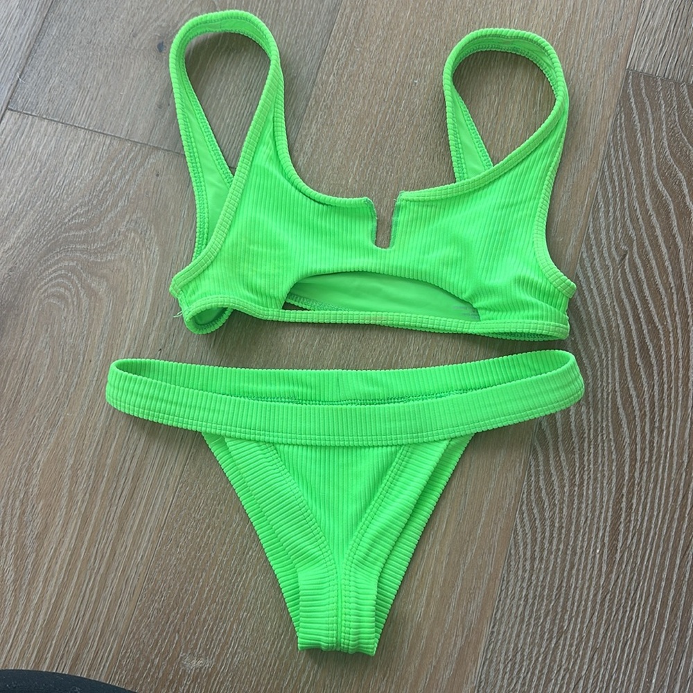 Frankie’s neon green bikini